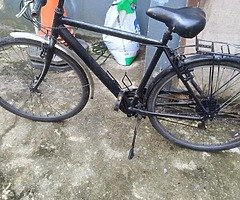 Two bikes for sale black one for 70 blue one for 80