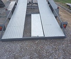 Tilt bed transporter