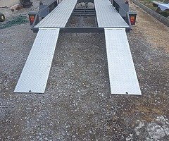 Tilt bed transporter