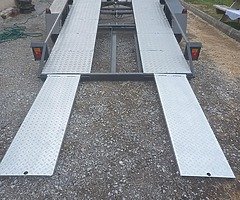 Tilt bed transporter