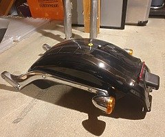 Breakout rear guard fender