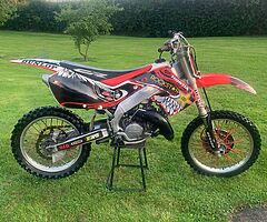 Cr 125