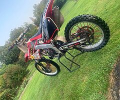 Cr 125