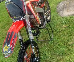 Cr 125