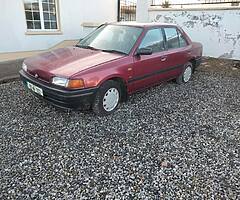 1993 MAZDA 323 34,000 MILES