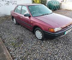 1993 MAZDA 323 34,000 MILES