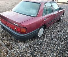 1993 MAZDA 323 34,000 MILES
