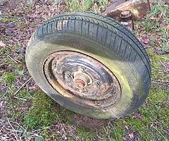 Axle with suspension and brakes