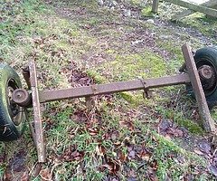 Axle with suspension and brakes