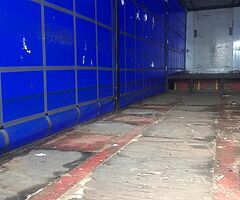 Step frame curtain sided trailer