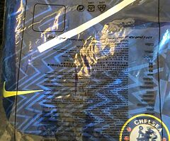 Chelsea jersey brand new size is in the picture.