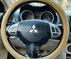 ميتسوبيشى لانسر شارك ٢٠١٥ خليجى فابريكا كامله مثبت سرعه وايرباج وطاره مالتى وشاشة عرض