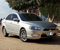 ميتسوبيشى لانسر شارك ٢٠١٥ خليجى فابريكا كامله مثبت سرعه وايرباج وطاره مالتى وشاشة عرض - Image 3/10