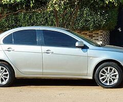 ميتسوبيشى لانسر شارك ٢٠١٥ خليجى فابريكا كامله مثبت سرعه وايرباج وطاره مالتى وشاشة عرض - Image 6/10