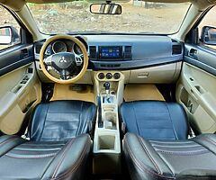 ميتسوبيشى لانسر شارك ٢٠١٥ خليجى فابريكا كامله مثبت سرعه وايرباج وطاره مالتى وشاشة عرض - Image 7/10