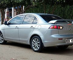 ميتسوبيشى لانسر شارك ٢٠١٥ خليجى فابريكا كامله مثبت سرعه وايرباج وطاره مالتى وشاشة عرض - Image 8/10