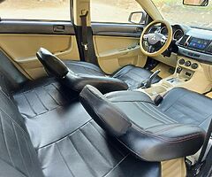 ميتسوبيشى لانسر شارك ٢٠١٥ خليجى فابريكا كامله مثبت سرعه وايرباج وطاره مالتى وشاشة عرض - Image 9/10