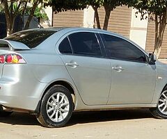 ميتسوبيشى لانسر شارك ٢٠١٥ خليجى فابريكا كامله مثبت سرعه وايرباج وطاره مالتى وشاشة عرض - Image 10/10