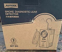 Smoke leak detector for vehicles with a boost leak or intake manifold leak