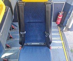 7 single seats with belts