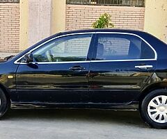 لانسر بومه ٢٠٠٨ اوتوماتيك خليجى كامله رخصه سنه باسمى مرور الدقى عداد ١٧٥ الف - Image 4/10