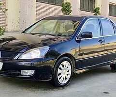 لانسر بومه ٢٠٠٨ اوتوماتيك خليجى كامله رخصه سنه باسمى مرور الدقى عداد ١٧٥ الف - Image 10/10