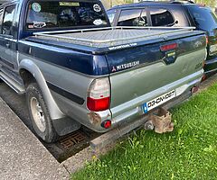2003 Mitsubishi L200 2.5 4d56 Tdi.5 seater Crew cab tax 333e per year .Doe(cvrt)12/22 Tax paid 6/22