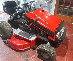 Sit  on  lawn mower   due   to   time   wasters   back  up  again  mower  driving   an  all no text