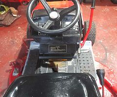 Sit  on  lawn mower   due   to   time   wasters   back  up  again  mower  driving   an  all no text