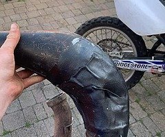 Anyone got expansion chamber of a yz 125 03 needed ASAP and kick start