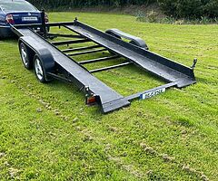 Tilt bed transporter