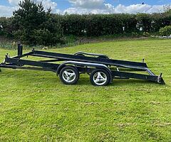 Tilt bed transporter