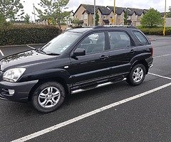 06 Kia Sportage,