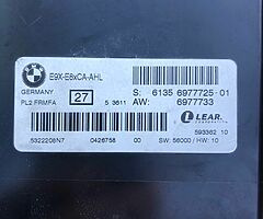 E90 xenon lights footwell module