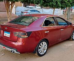 كيا سيراتو ٢٠١١ اوتوماتيك الفتيس الجديد ٦غيار ايرباج وطاره مالتى وجنوط فابريكا ماعدا حزام