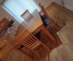 Table and with 6 chair like new