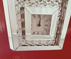 Teardrop diamond clock