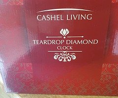 Teardrop diamond clock