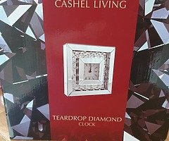 Teardrop diamond clock