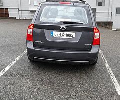 Kia Caren 2 liter disel 7 sets