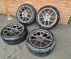 Japan Racing JR30 17 Inch 4x100 Alloy Wheels + Bridgestone 205 45 17 Tyres & Spigot Rings