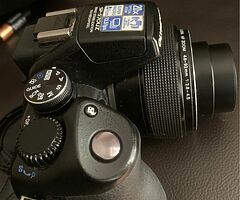 Olympus SP-57ouz Digital camera - Image 3/8