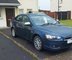 2011 Mitsubishi Lancer Base triam