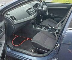 2011 Mitsubishi Lancer Base triam