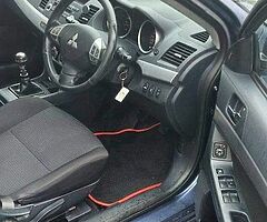 2011 Mitsubishi Lancer Base triam - Image 6/9