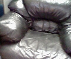 leather armchair and footstool