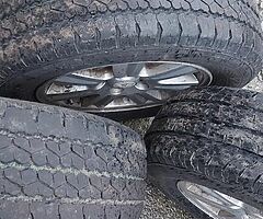 4 brand new tires with commercial wheels of roald