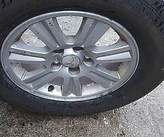 4 brand new tires with commercial wheels of roald