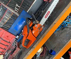 Two consaws and a chain saw