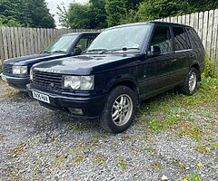 Two P38 Range Rovers